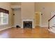 Comfortable living room with fireplace, hardwood floors, and open floor plan at 4924 Locklear Way, Marietta, GA 30066