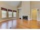 Bright living room with hardwood floors, fireplace, and high ceilings at 4924 Locklear Way, Marietta, GA 30066