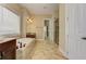 Luxurious main bathroom features a soaking tub and tile floors at 4924 Locklear Way, Marietta, GA 30066