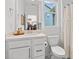 Neat bathroom with modern features and toilet at 6045 Stargazer Way, Cumming, GA 30028