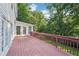 Large backyard deck providing ample space for outdoor seating and enjoying nature views at 6841 Fairway Ridge Dr, Douglasville, GA 30134