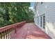 Spacious wooden deck perfect for outdoor living and entertaining with lush, green backdrop at 6841 Fairway Ridge Dr, Douglasville, GA 30134