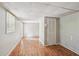 Finished basement featuring wood-look flooring and access to a well-lit adjacent room at 6841 Fairway Ridge Dr, Douglasville, GA 30134