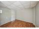Finished basement with wood-look flooring and painted walls, ready for personalization at 6841 Fairway Ridge Dr, Douglasville, GA 30134