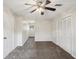 Bedroom with carpeting, closet with louvered doors, and ceiling fan at 6841 Fairway Ridge Dr, Douglasville, GA 30134