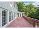 Expansive upper deck with multiple access points and views of surrounding trees at 6841 Fairway Ridge Dr, Douglasville, GA 30134
