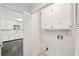 Well-maintained laundry space beside kitchen offering functionality and storage at 6841 Fairway Ridge Dr, Douglasville, GA 30134