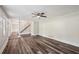 Bright and open living room shows beautiful flooring and staircase at 6841 Fairway Ridge Dr, Douglasville, GA 30134