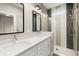 Modern bathroom featuring double vanity, shower and decorative tile at 2329 Mason Dr # D24, Atlanta, GA 30316