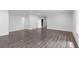 Spacious basement area featuring hardwood floors and white walls and trim at 2602 Drew Valley Ne Rd, Brookhaven, GA 30319