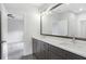 Sleek bathroom with double vanity, and extra lighting at 2602 Drew Valley Ne Rd, Brookhaven, GA 30319
