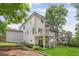 Modern home with a back deck overlooking the backyard putting green and beautiful landscaping at 2602 Drew Valley Ne Rd, Brookhaven, GA 30319
