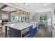 Beautiful open kitchen with an oversized island, modern appliances, and seamless connection to living spaces at 2602 Drew Valley Ne Rd, Brookhaven, GA 30319