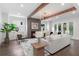 Inviting living room features a fireplace, hardwood floors, and plenty of seating at 2602 Drew Valley Ne Rd, Brookhaven, GA 30319