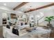 Spacious living room showcasing an open floor plan connecting to the kitchen and dining area at 2602 Drew Valley Ne Rd, Brookhaven, GA 30319
