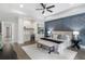 Bright main bedroom boasts an en suite wet bar and seating area with a bench at 2602 Drew Valley Ne Rd, Brookhaven, GA 30319