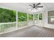 Cozy screened-in porch overlooking lush greenery, perfect for relaxing and enjoying the outdoors at 2602 Drew Valley Ne Rd, Brookhaven, GA 30319