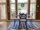 Dining area with windows overlooking the outside patio area at 9602 Coastal Pointe Dr, Villa Rica, GA 30180