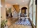 Inviting dining area with hardwood floors, large windows, and elegant furnishings, perfect for Gathering meals and gatherings at 9602 Coastal Pointe Dr, Villa Rica, GA 30180