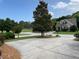 Residential home nestled on a lush green lot, featuring a well-manicured lawn and mature trees for added privacy at 9602 Coastal Pointe Dr, Villa Rica, GA 30180
