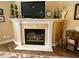 Close-up of a decorative fireplace in a living room setting at 9602 Coastal Pointe Dr, Villa Rica, GA 30180