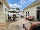 Outdoor patio area featuring a dining set, lounge seating, and flagstone flooring at 9602 Coastal Pointe Dr, Villa Rica, GA 30180