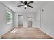 Primary bedroom with a ceiling fan features an ensuite bathroom and walk-in closet at 1891 Sahara Se Dr, Atlanta, GA 30316