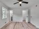 Bright bedroom with new floors, ceiling fan, access to bathroom and closet at 1891 Sahara Se Dr, Atlanta, GA 30316