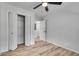 Bedroom featuring hardwood flooring, closet, and ceiling fan at 1891 Sahara Se Dr, Atlanta, GA 30316