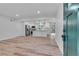 The open floor plan gives a view of the kitchen with an island, stainless steel appliances, and subway tile at 1891 Sahara Se Dr, Atlanta, GA 30316