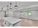 View of the open kitchen featuring a center island with a quartz countertop and stainless steel appliances at 1891 Sahara Se Dr, Atlanta, GA 30316