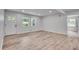 The living room features a large window and access to additional rooms in an open floor plan concept at 1891 Sahara Se Dr, Atlanta, GA 30316