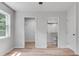 Primary bedroom with access to an ensuite bathroom featuring updated fixtures at 1891 Sahara Se Dr, Atlanta, GA 30316
