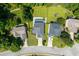 An aerial view of the property showcases the home's location in a lush, tree-lined neighborhood at 3362 Palm Nw Cir, Kennesaw, GA 30144