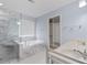 Bathroom with a glass walk-in shower, double sinks, and marble detailing at 3362 Palm Nw Cir, Kennesaw, GA 30144