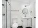Bathroom with shower, white vanity, and black fixtures at 5490 Chemin De Vie, Sandy Springs, GA 30342