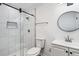 Updated bathroom with glass shower and a sleek vanity at 5490 Chemin De Vie, Sandy Springs, GA 30342