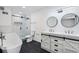 Large bathroom with freestanding tub, glass shower, and double sink vanity at 5490 Chemin De Vie, Sandy Springs, GA 30342