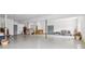 Unfinished basement with a large open space and multiple entry points, offering potential for customization at 55 Rocky Ne Cir, White, GA 30184