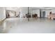 Unfinished basement with concrete floor and open layout, providing flexible space for various uses at 55 Rocky Ne Cir, White, GA 30184