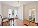 Bright home office with natural light, hardwood floors, and access to the ensuite bathroom at 55 Rocky Ne Cir, White, GA 30184