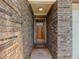Close up of the front door, showing the brick entryway at 10 Stewart Hollow Ln, Covington, GA 30016