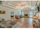 Spacious living room with tray ceilings, a fireplace, and lots of natural light at 10 Stewart Hollow Ln, Covington, GA 30016