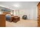 The primary bedroom features a comfortable bed, and neutral colored walls at 1310 Chilton Woods Rd, Rutledge, GA 30663