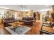 Spacious living room featuring hardwood floors and comfortable seating at 1310 Chilton Woods Rd, Rutledge, GA 30663