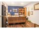 Office space with a large desk, ample storage, and neutral colored walls at 1310 Chilton Woods Rd, Rutledge, GA 30663