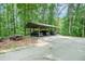 Carport area provides covered parking for multiple vehicles at 1310 Chilton Woods Rd, Rutledge, GA 30663