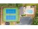 Aerial shot of community amenities showcasing tennis courts, pool, and clubhouse with convenient parking at 2722 Brookhaven Ln, Buford, GA 30518