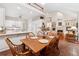 Open-concept design with dining area, kitchen, and living room with plenty of space for entertaining at 2722 Brookhaven Ln, Buford, GA 30518