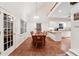 Dining area open to kitchen featuring tile flooring, table with chairs and lots of natural light at 2722 Brookhaven Ln, Buford, GA 30518
